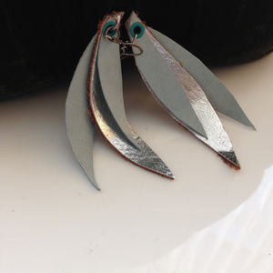 One of a kind NWT Silver and  blueLeather earrings